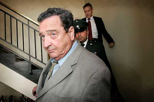 Ex juez argentino Otilio Romano permanece en dependencias de Interpol en Santiago